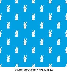 Hand with victory sign pattern repeat seamless in blue color for any design. Vector geometric illustration