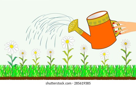 Hand watering can and flowers
