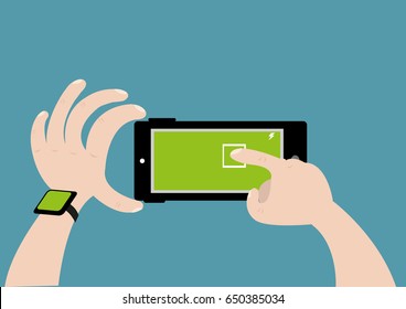 A hand with wearable tech touches the screen of the mobile phone camera to focus or take a shot. Editable Clip art.