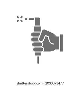 Hand with welding torch, welder tools grey icon.