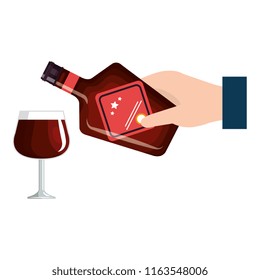 hand with whiskey bottle and cup