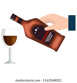 hand with whiskey bottle and cup