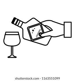 hand with whiskey bottle and cup