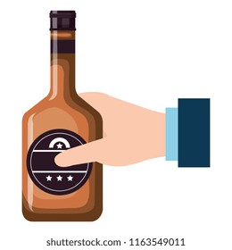 hand with whiskey bottle drink