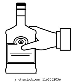 hand with whiskey bottle drink
