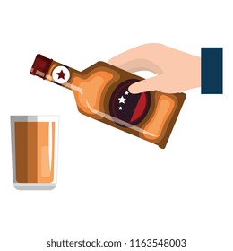 hand with whiskey bottle and glass