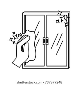 hand wiping window with cloth