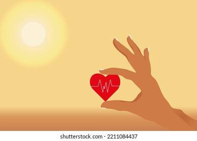 Hand of woman hold a heart with a cardiogram symbol on the sunrise background with copy space. Concept of life insurance. Health and medical insurance of people.