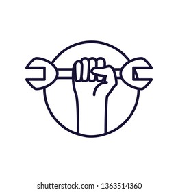 hand with wrench tool in frame circular