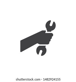 Hand with wrench vector icon. filled flat sign for mobile concept and web design. Hand holding spanner glyph icon. Repair service symbol, logo illustration. Vector graphics