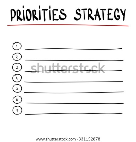  hand writing  PRIORITIES STRATEGY with black marker on transparent  board