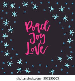 Hand written card with three words - Peace, Joy, Love.