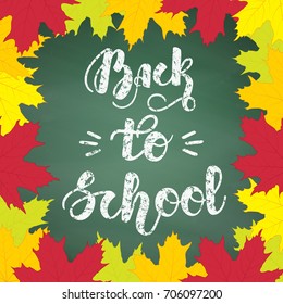 Hand written chalk lettering "Back to school" on green chalkboard background with maple colorful leaves. Vector illustration. EPS10.