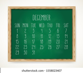 Hand written chalk vector calendar for December year 2019 over green chalkboard background in a wooden frame.