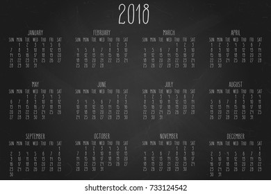 Hand written chalk vector calendar for the year 2018 over black chalkboard background.