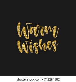 Hand written holiday phrase - Warm wishes. Golden glitter calligraphy isolated on black background. Great element for your Christmas design