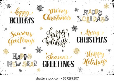 Hand written New Year phrases. Greeting card text  with snowflakes isolated on white background. Happy holidays lettering in modern calligraphy style. Merry Christmas and Season's Greetings lettering