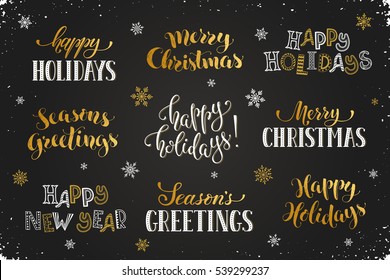 Hand written New Year phrases. Greeting card text template with snowflakes drawn on chalkboard. Happy holidays lettering in modern calligraphy style. Merry Christmas and Season's Greetings lettering