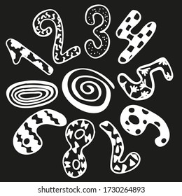Hand written numbers 0-9 in circle. Hand drawn lettering on black background.