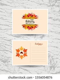 Hand written Thanksgiving card with autumn leaves. Front and back side of greeting card with autumn elements. Hand writing celebration lettering phrase on beige for invitation and congratulation.