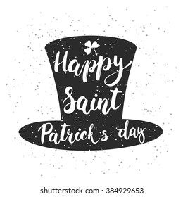 Hand written typography lettering phrase Happy Saint Patric's Day with clover on the white background . Modern calligraphy background for typography greeting with Happy Saint Patric's Day