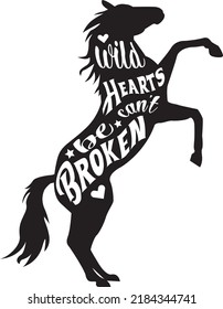 Hand Written Wild Heart Vector Lettering With Black Horse Silhouette. Vector Jumping Horse Cutout  With Calligraphy Phrase. Vector Illustration Isolated For Print And Poster. Typography Design. EPS 10