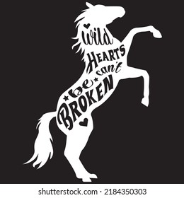 Hand Written Wild Heart Vector Lettering With White Horse Silhouette. Vector Jumping Horse Cutout  With Calligraphy Phrase. Vector Illustration Isolated For Print And Poster. Typography Design. EPS 10