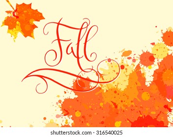 Hand written word Fall in bright orange watercolor paint splatter frame with maple leaf. Contemporary calligraphy.