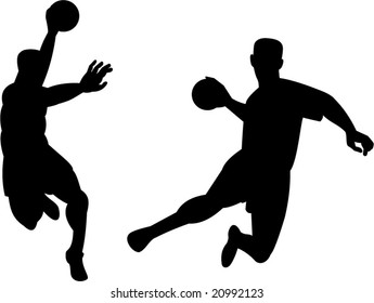 Handball player jumping with ball