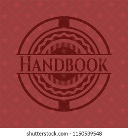 Handbook badge with red background