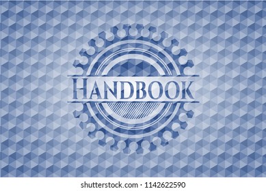 Handbook blue badge with geometric pattern.
