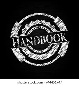 Handbook chalk emblem written on a blackboard
