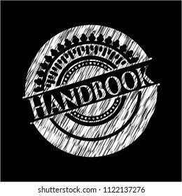 Handbook written on a blackboard