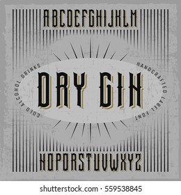 Handcrafted 'Dry Gin' label font with decorations on a grey background. Dusty background.