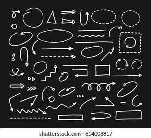 Handcrafted elements. Hand drawn vector arrows set on black background