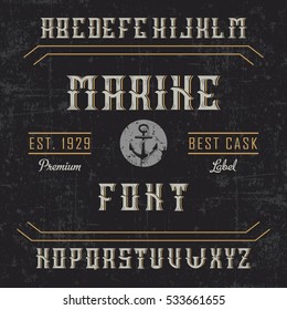 Handcrafted 'Marine' font with an anchor and decorations, dusty background