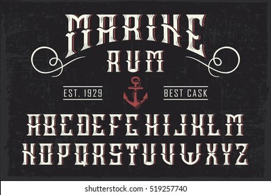 Handcrafted 'Marine Rum' font with and anchor and decoration, vintage background 