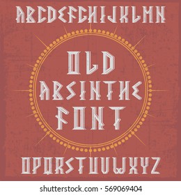 Handcrafted 'Old Absinthe' font in the circle with decoration. Vintage font. 