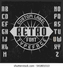 Handcrafted 'Retro' font in the circle with decorations. Dusty background.