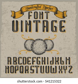 Handcrafted 'Vintage' font with barrels and a ribbon. Dusty background.