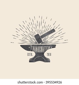 Handcrafted. Vintage styled vector illustration of the hammer and anvil