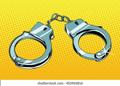 Handcuffs arrest crime pop art retro vector. Iron shackles, the symbol of prison