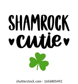 The hand-drawing funny inscription: Shamrock cutie, for St. Patrick's Day. It can be used for invitation card, brochures, poster and other promo materials.