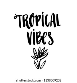The hand-drawing inscription: Tropical vibes, with a flower, on a white background. It can be used for cards, brochures, poster, t-shirts, mugs and other promotional marketing materials.