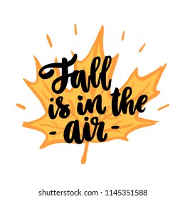 The hand-drawing quote: Fall is in the air, with maple leaf. It can be used for a sticker, patch, invitation card, brochures, poster etc.