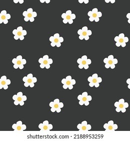 Hand-drawn abstract chamomile flowers in a seamless pattern on a white background. Repeating floral vector pattern.