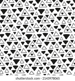 Hand-drawn abstract shapes seamless background pattern. Monochrome texture with handwritten figures. Black and white freehand triangles. Doodle print for modern fabric, textile, cover. Gray wallpaper.