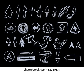Flechas dibujadas a mano sobre negro