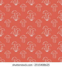 Hand-drawn autumn pattern with boletus and honey mushrooms on a light red background in sketch style. Fall seamless background with subtle hand-drawn botanical elements