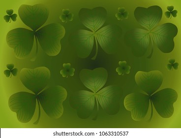 Hand-drawn background of a green Irish three-leaved clover of various sizes chaotically arranged leaves on a green background